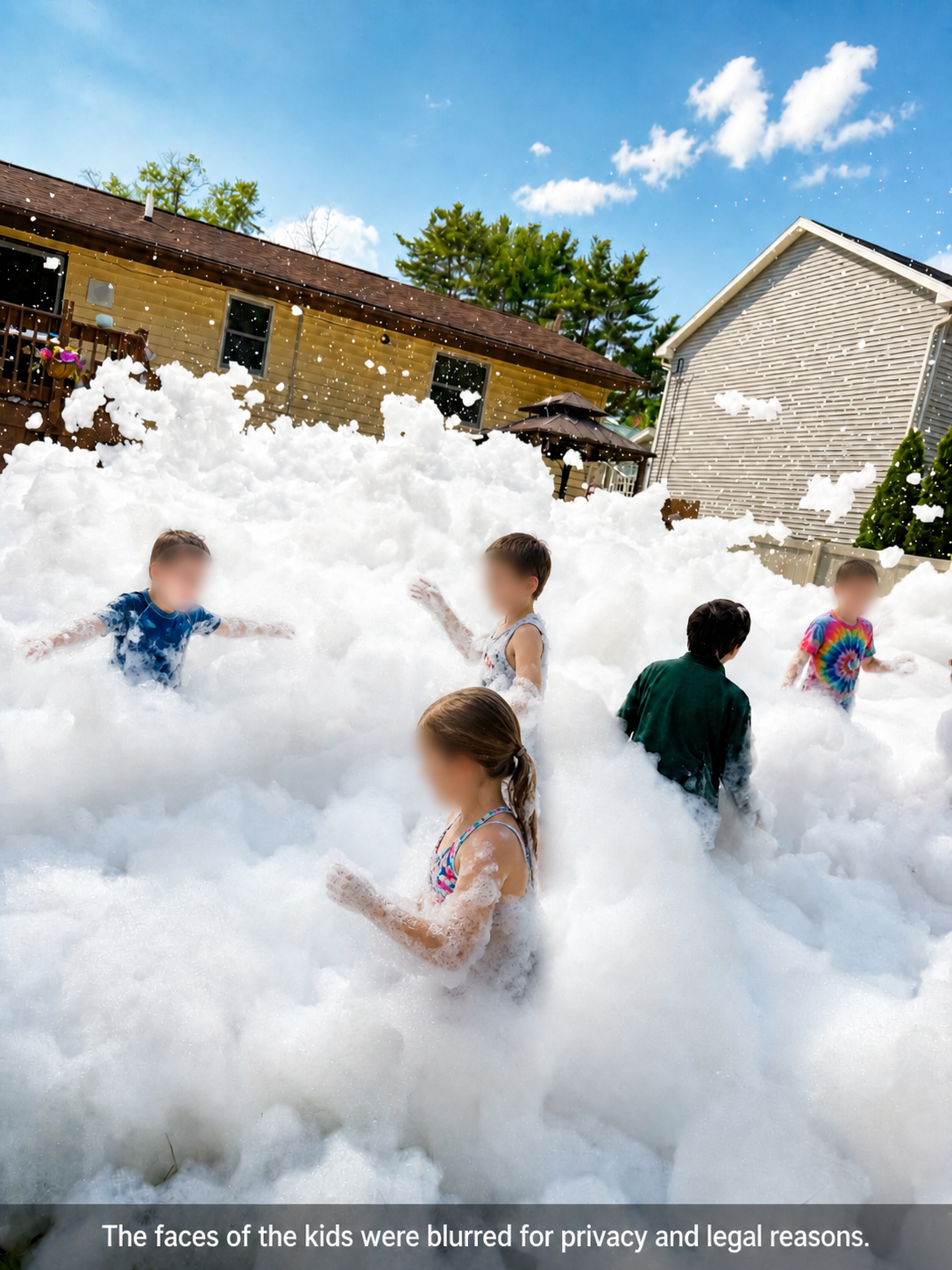 Children walking through a wall of foam