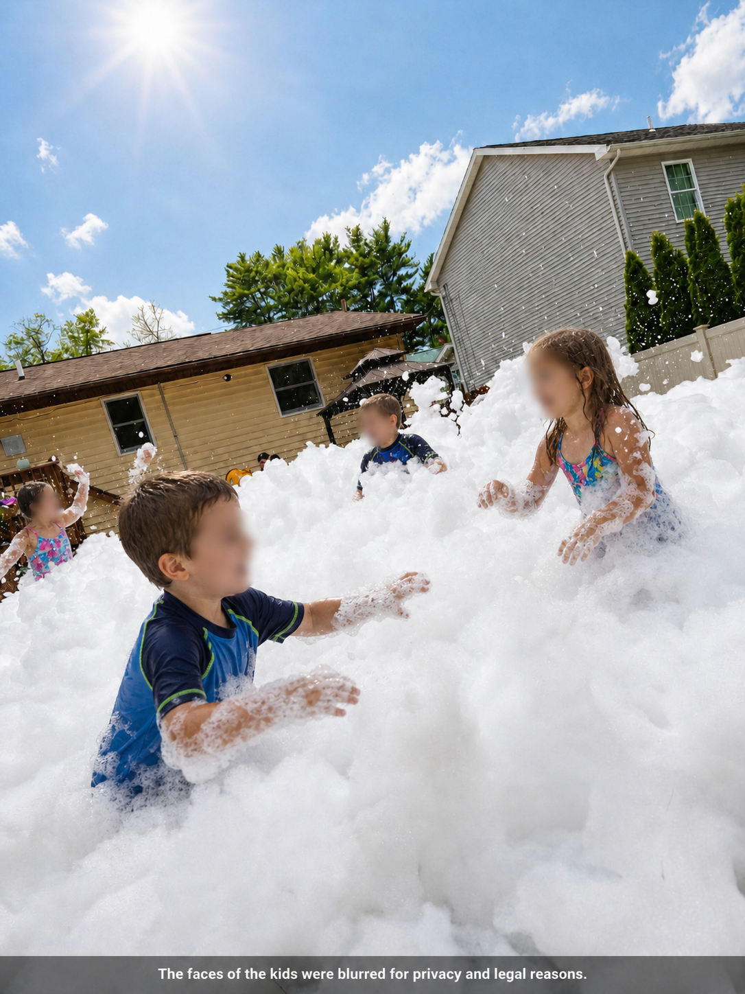 Kids playing together in thick white foam